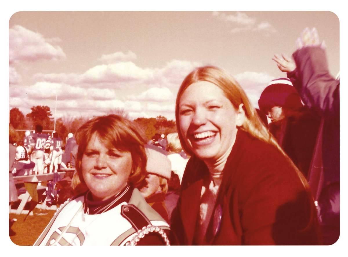 Maris Timmer Tracy &#8217;78, left, and Kathleen (Ure) Bell &#8217;81 are pictured at Homecoming 1978, prior to receiving their prizes for the Lyrics Contest.